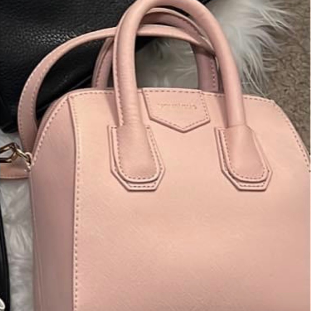 Baby pink BRAND NEW YOUNIQUE clutch crossover bag